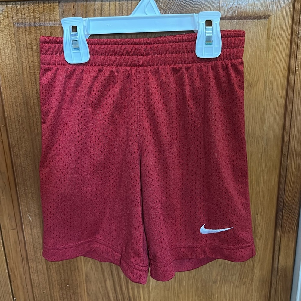 Red Nike shorts